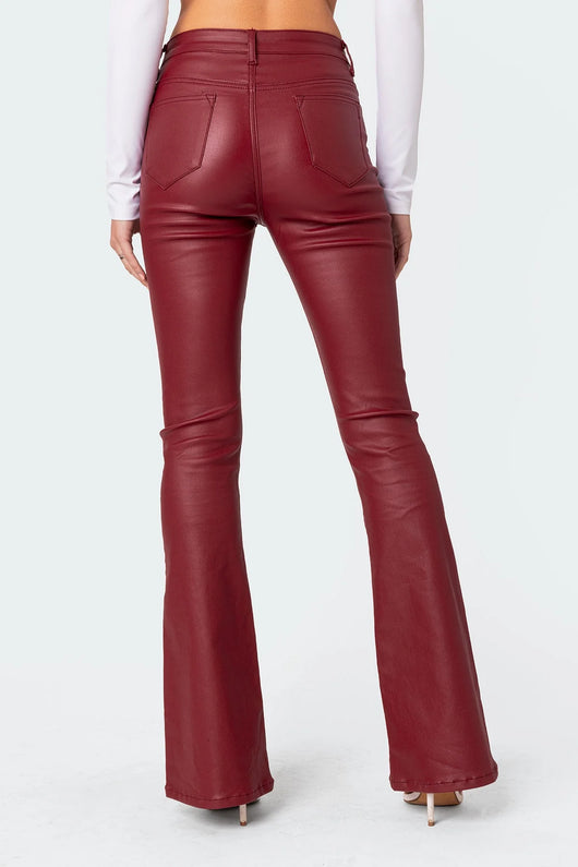 Burgundy faux leather flared pants - back view