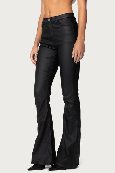 Black faux leather flared pants - back view